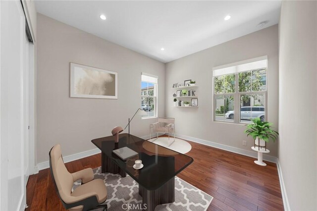 124 Trumpet Flower, Irvine, CA 92618 - home office with healthy amount of natural light, wood finished floors, baseboards, and recessed lighting