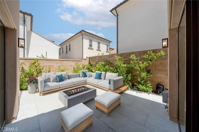 124 Trumpet Flower, Irvine, CA 92618 - view of patio with a fenced backyard and an outdoor living space with a fire pit