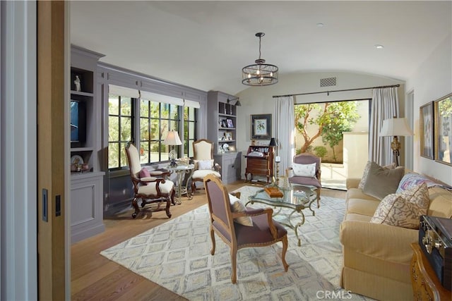 17 Pacific Ridge Pl, Dana Point, CA 92629 - sitting room with lofted ceiling, a chandelier, wood finished floors, and built in features