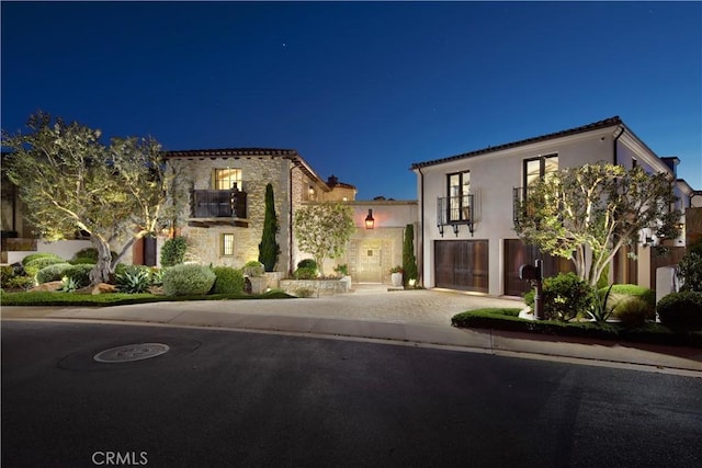17 Pacific Ridge Pl, Dana Point, CA 92629 - mediterranean / spanish-style home with decorative driveway, stucco siding, and stone siding