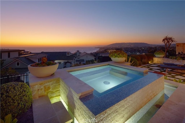 17 Pacific Ridge Pl, Dana Point, CA 92629 - pool at dusk featuring an in-ground hot tub