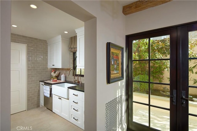 17 Pacific Ridge Pl, Dana Point, CA 92629 - kitchen featuring a sink, dark countertops, stainless steel dishwasher, white cabinets, and recessed lighting