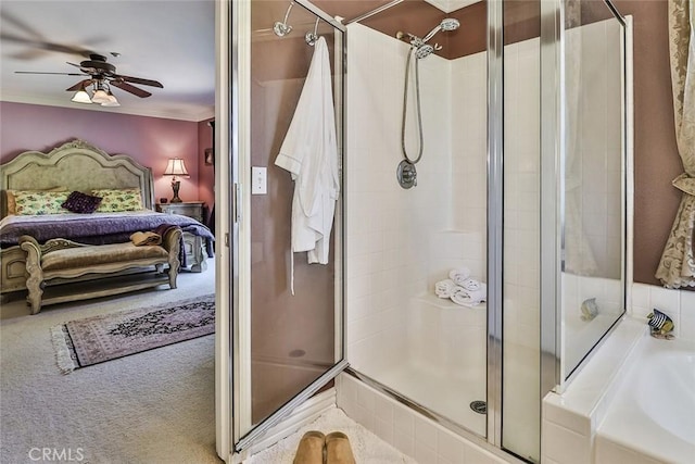 ensuite bathroom featuring ceiling fan, a shower stall, a bath, and ornamental molding