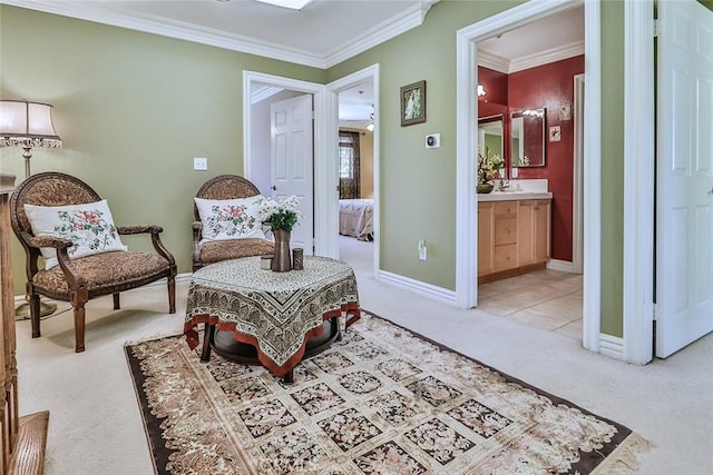 living area with light carpet, baseboards, and ornamental molding
