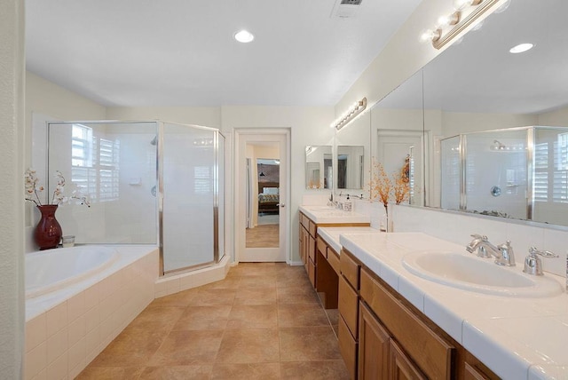 2217 Corte, San Simeon, Chula Vista, CA 91914 - full bathroom with a stall shower, double vanity, a bath, recessed lighting, and tile patterned floors