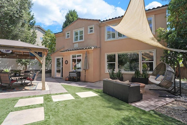 2217 Corte, San Simeon, Chula Vista, CA 91914 - back of property featuring stucco siding, a gazebo, a tile roof, an outdoor living space, and a yard