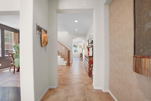 2217 Corte, San Simeon, Chula Vista, CA 91914 - corridor featuring baseboards, recessed lighting, stairs, light tile patterned floors, and an accent wall