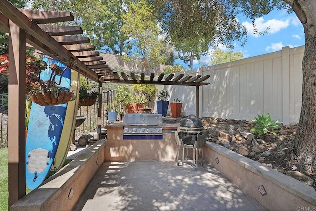 2217 Corte, San Simeon, Chula Vista, CA 91914 - view of patio with grilling area, an outdoor kitchen, a pergola, and fence