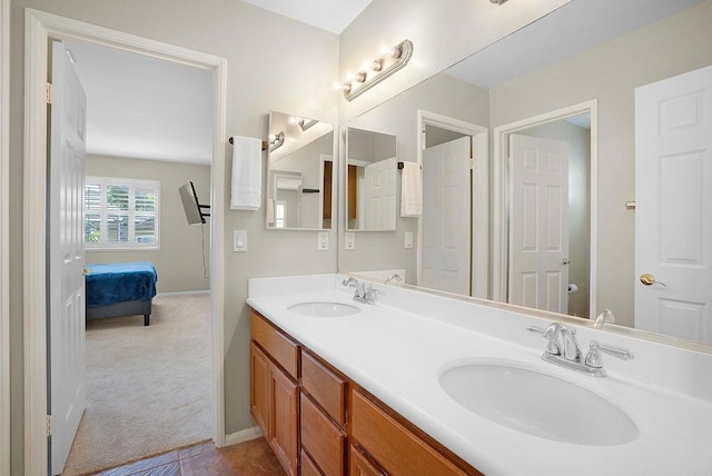 2217 Corte, San Simeon, Chula Vista, CA 91914 - ensuite bathroom with double vanity, baseboards, and tile patterned floors