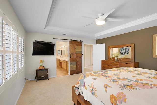 2217 Corte, San Simeon, Chula Vista, CA 91914 - bedroom featuring a tray ceiling, a barn door, light colored carpet, ensuite bath, and ornamental molding