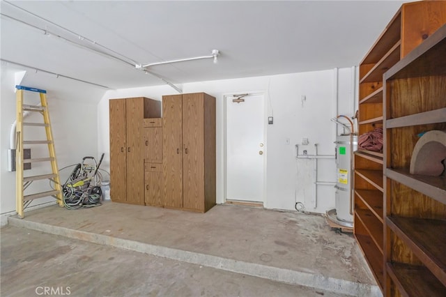 garage with strapped water heater