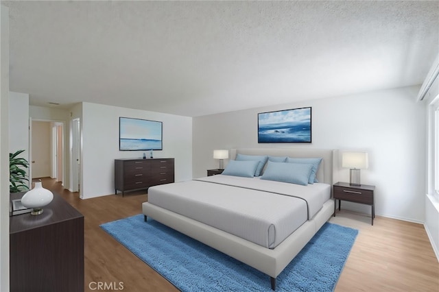 bedroom with light wood-style floors