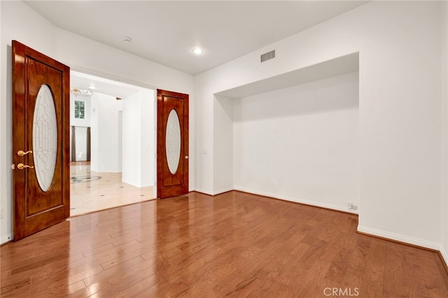 2117 Brittany Park Rd, Camarillo, CA 93012 - foyer with wood finished floors, a chandelier, baseboards, and recessed lighting