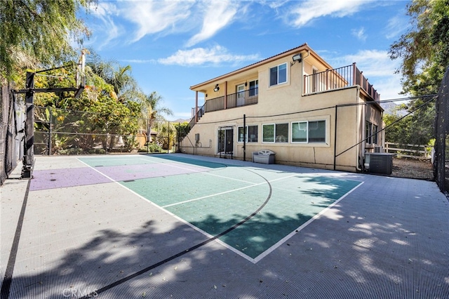 2117 Brittany Park Rd, Camarillo, CA 93012 - view of basketball court featuring basketball hoop and fence