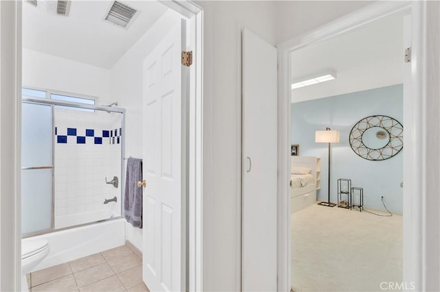 4745 Dunsmore Ave, La Crescenta, CA 91214 - bathroom with combined bath / shower with glass door, toilet, and tile patterned floors