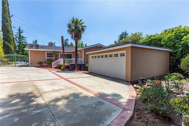ranch-style house featuring an attached garage