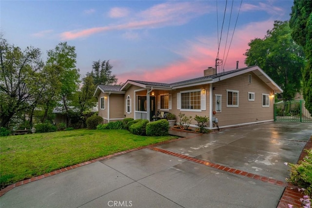 4745 Dunsmore Ave, La Crescenta, CA 91214 - single story home with covered porch, driveway, and a chimney