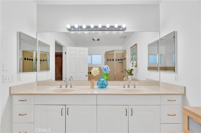 bathroom featuring double vanity