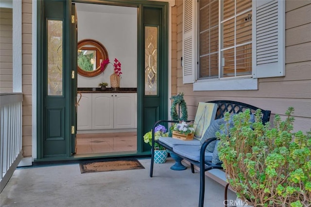 doorway to property featuring a porch