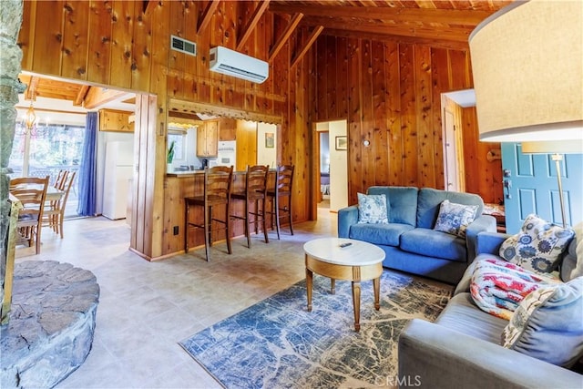 26220 Pine Dell Rd, Idyllwild, CA 92549 - living area with an AC wall unit, wood walls, wood ceiling, and high vaulted ceiling