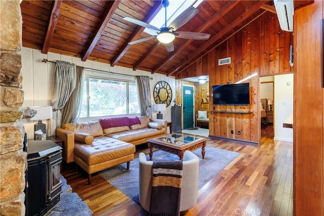 26220 Pine Dell Rd, Idyllwild, CA 92549 - living room with wood ceiling, a wood stove, hardwood / wood-style floors, ceiling fan, and high vaulted ceiling