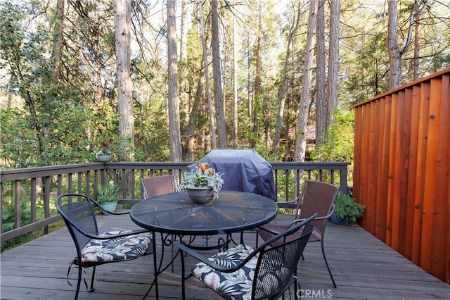 26220 Pine Dell Rd, Idyllwild, CA 92549 - wooden deck with outdoor dining area and area for grilling