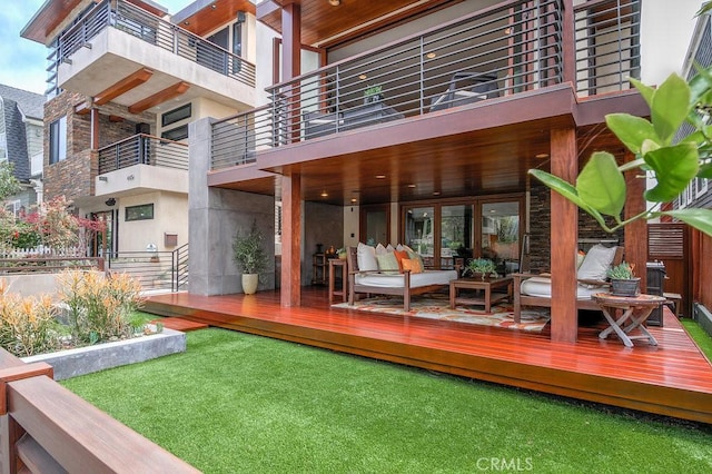 436 32nd St, Manhattan Beach, CA 90266 - rear view of property with stone siding, outdoor lounge area, and stucco siding