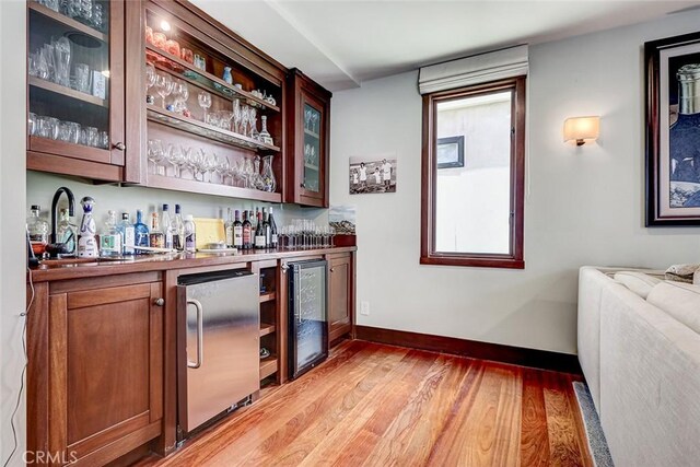 436 32nd St, Manhattan Beach, CA 90266 - indoor bar with fridge, wine cooler, and light wood finished floors