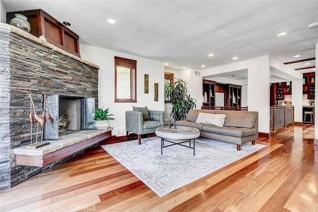 436 32nd St, Manhattan Beach, CA 90266 - living area with light wood finished floors, a fireplace with raised hearth, and recessed lighting