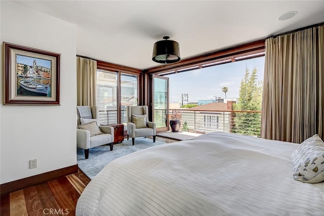 436 32nd St, Manhattan Beach, CA 90266 - bedroom with baseboards and wood finished floors