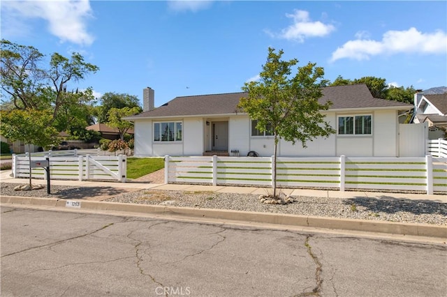 1263 Sandra Ct, Upland, CA 91786 - view of front facade featuring a chimney