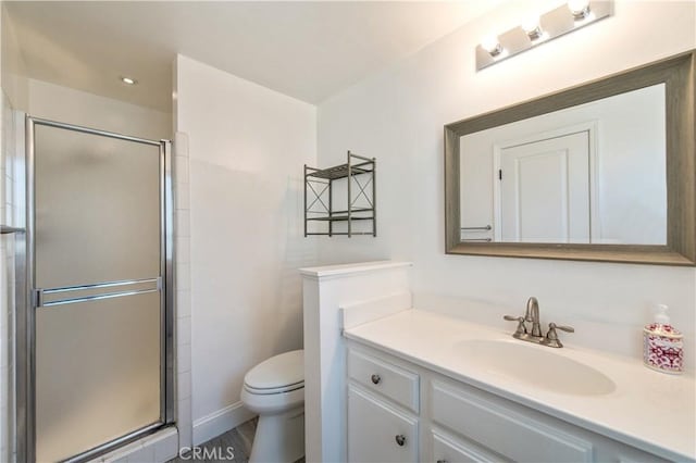 1263 Sandra Ct, Upland, CA 91786 - bathroom with vanity, a stall shower, toilet, recessed lighting, and baseboards