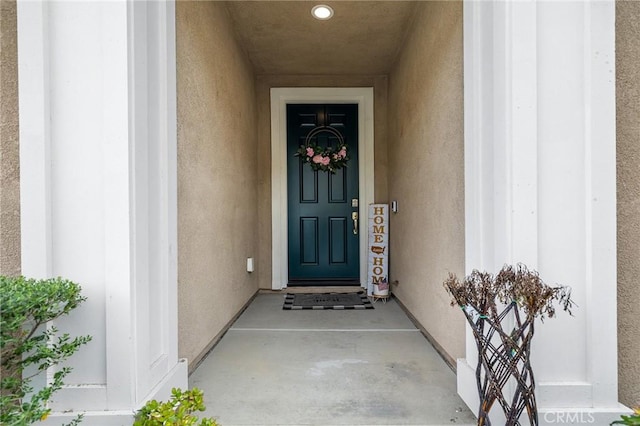 24521 Snapdragon Way, Lake Elsinore, CA 92532 - entrance to property featuring stucco siding