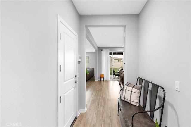 24521 Snapdragon Way, Lake Elsinore, CA 92532 - corridor with light wood finished floors