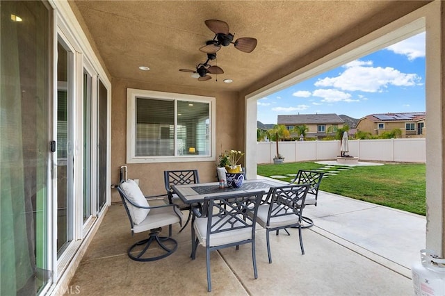 24521 Snapdragon Way, Lake Elsinore, CA 92532 - view of patio / terrace featuring outdoor dining space and a ceiling fan