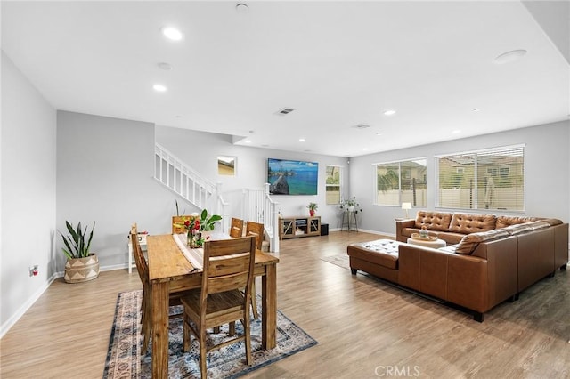 24521 Snapdragon Way, Lake Elsinore, CA 92532 - dining room with stairs, light wood-type flooring, baseboards, and recessed lighting