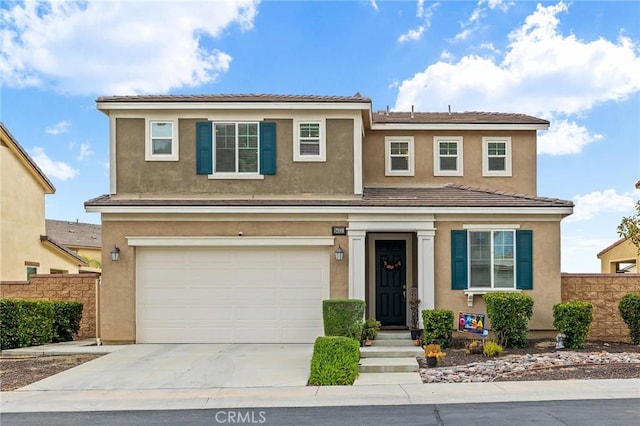 24521 Snapdragon Way, Lake Elsinore, CA 92532 - traditional-style home featuring a garage, concrete driveway, and stucco siding