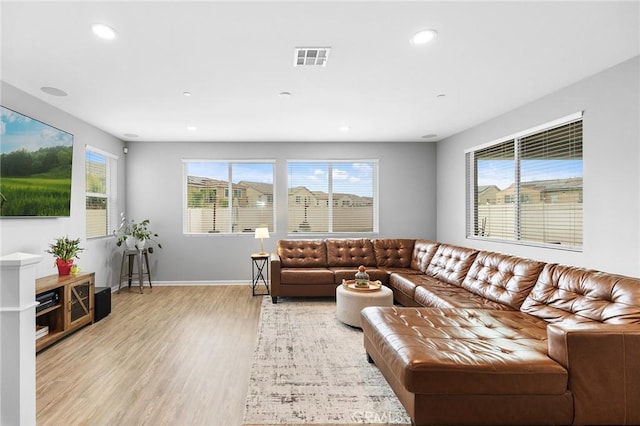 24521 Snapdragon Way, Lake Elsinore, CA 92532 - living area featuring light wood-style flooring, recessed lighting, and baseboards