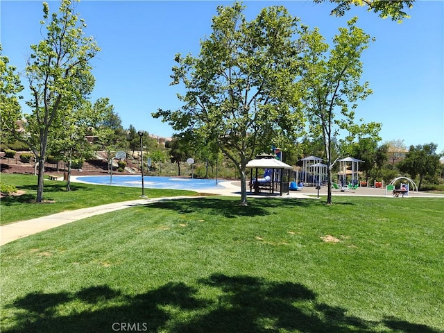 view of community featuring a lawn and a gazebo