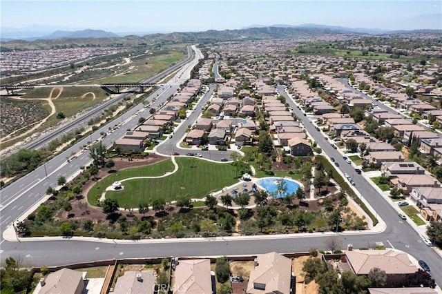 view of property location featuring nearby suburban area and a mountainous background