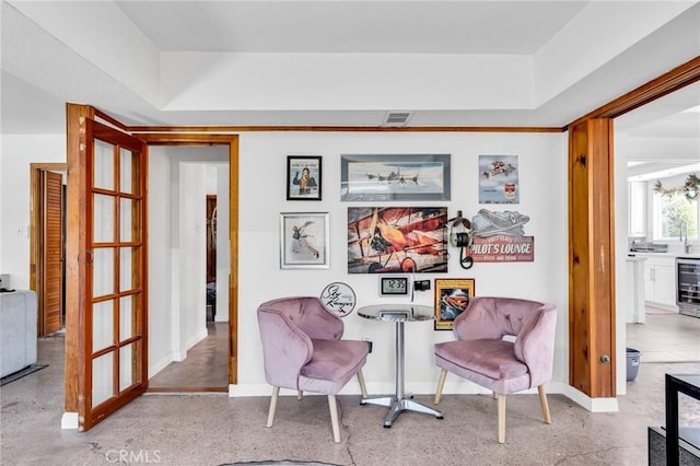 33645 Kobe Rd, Agua Dulce, CA 91390 - living area with beverage cooler, a raised ceiling, and baseboards