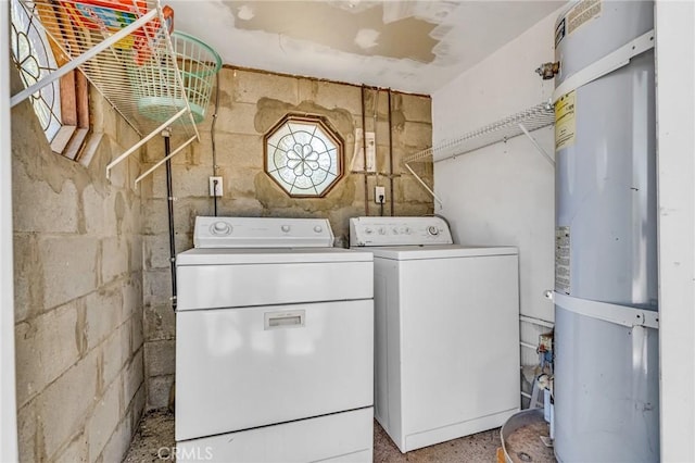 33645 Kobe Rd, Agua Dulce, CA 91390 - washroom with independent washer and dryer, strapped water heater, and concrete block wall