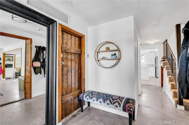 33645 Kobe Rd, Agua Dulce, CA 91390 - hallway featuring concrete flooring, stairs, and baseboards