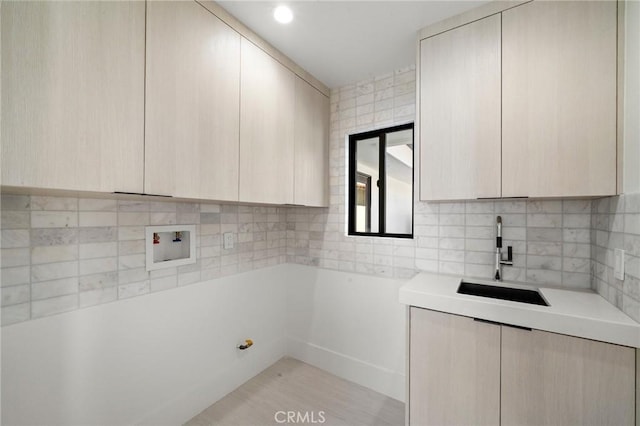 laundry area with cabinet space and washer hookup