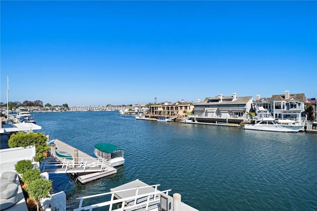 water view featuring a dock