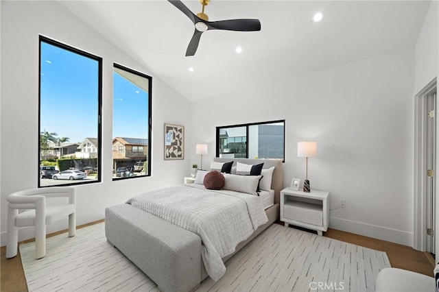 bedroom with baseboards, lofted ceiling, recessed lighting, light wood-style flooring, and ceiling fan