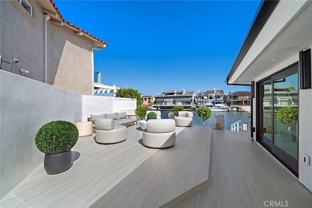 view of patio / terrace with a water view