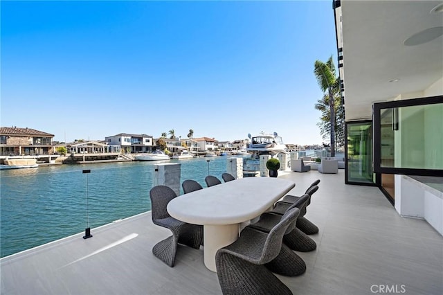 exterior space with a water view and a residential view
