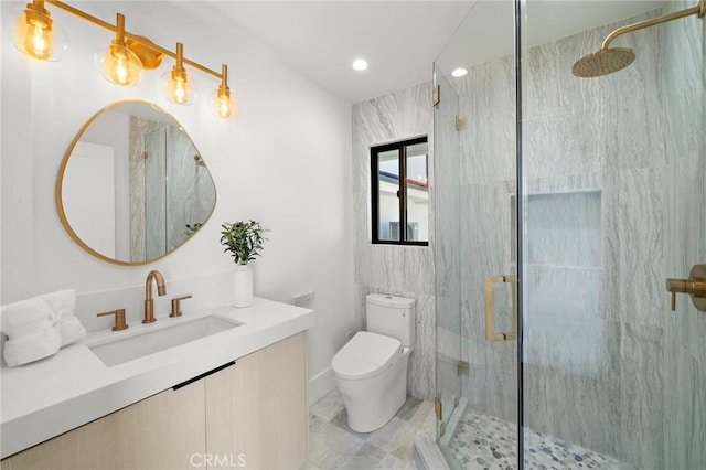 full bathroom with a marble finish shower, toilet, vanity, and recessed lighting