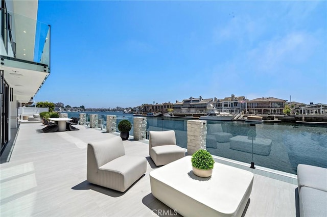 view of patio / terrace featuring a water view